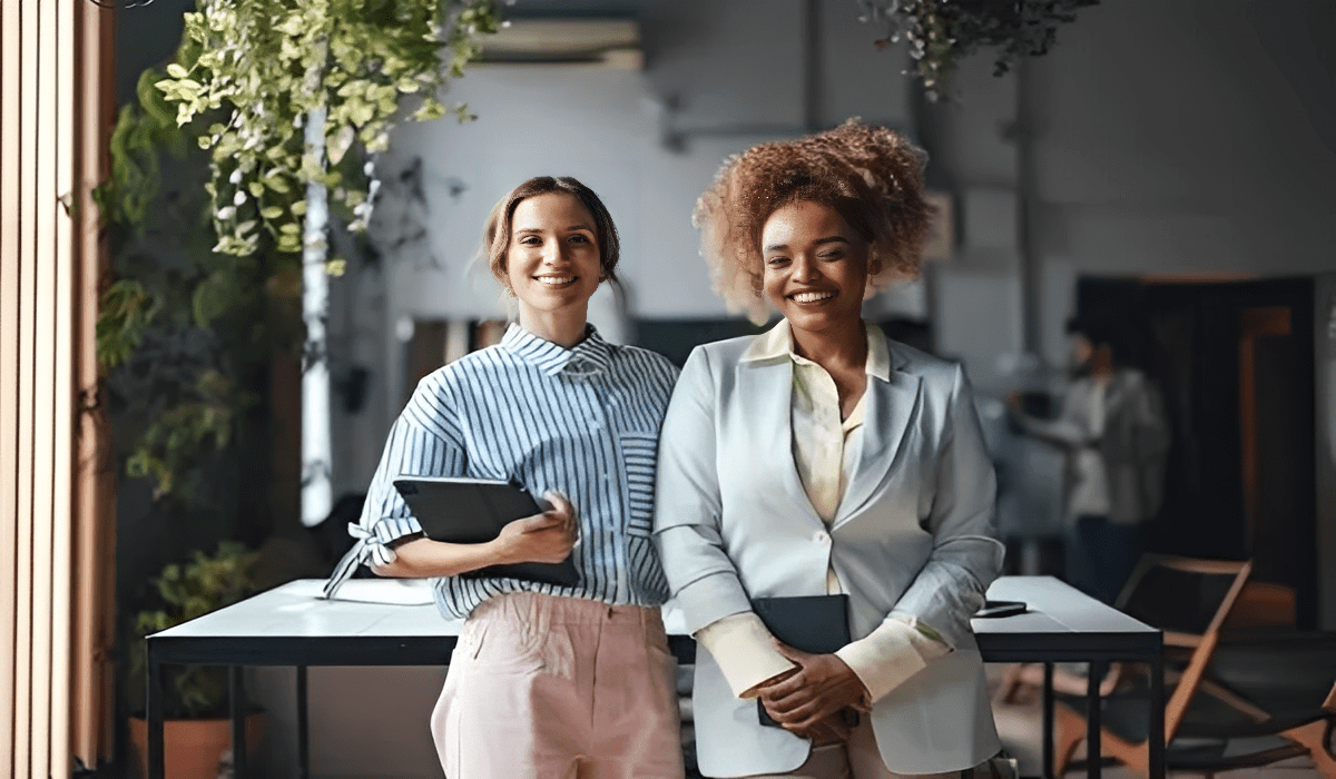 Professional women holding tablets